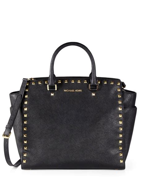 black patent michael kors tote|Michael Kors black studded handbag.